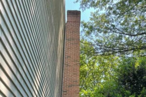 Sinking and Leaning Chimney