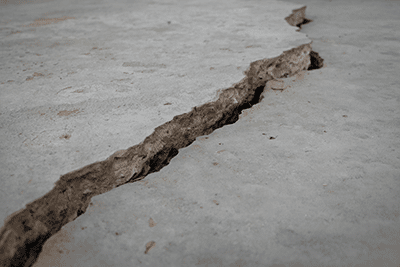 Sinking, Cracked Basement Concrete Slab